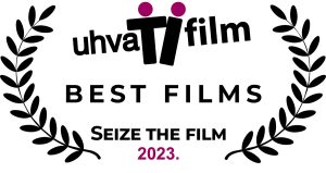 Između 2 venčića (simbol za nagradu) logo Uhvati fil, ispod piše Best films, Seize the film, 2023